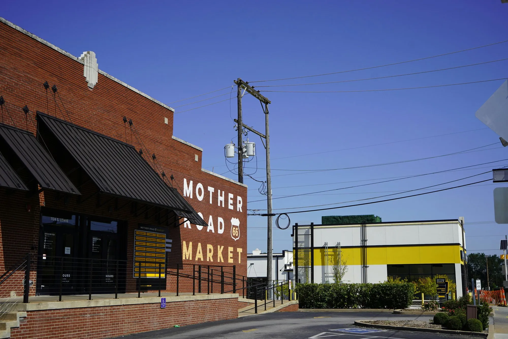 The Mother Road Market building with its painted sign and Route 66 shield